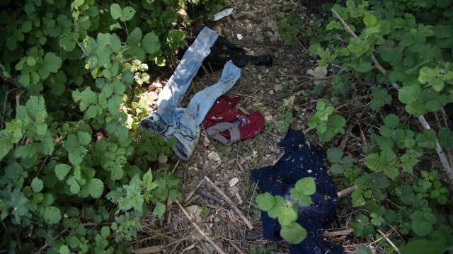 Articles of clothing apparently left behind by migrants at the river on the Greek-Turkish border